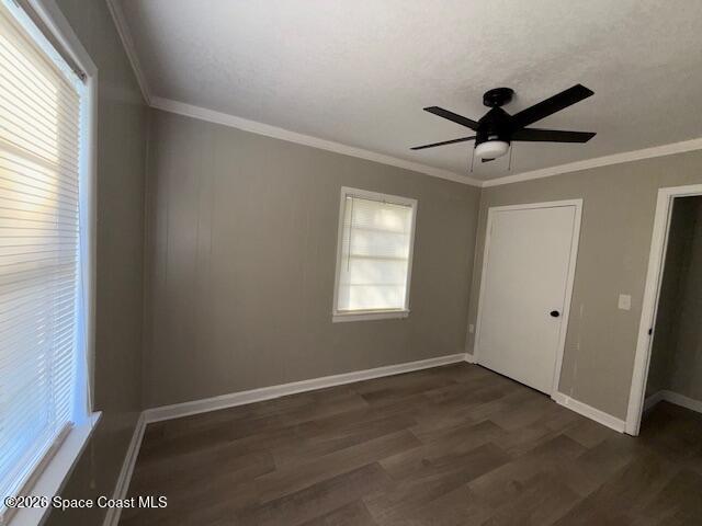 1925 Buffalo Road Titusville, FL 32796 - Photo 8 of 13 a view of a big room with wooden floor and windows in a room