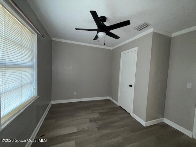 1925 Buffalo Road Titusville, FL 32796 - Photo 9 of 13 a view of a room with wooden floor and windows