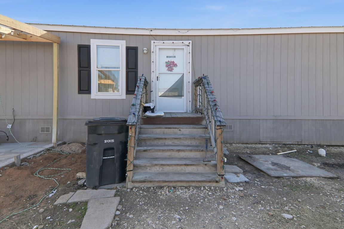 1130 Rustler Pass Kyle, TX 78640 - Photo 15 of 21 Entrance to property featuring crawl space