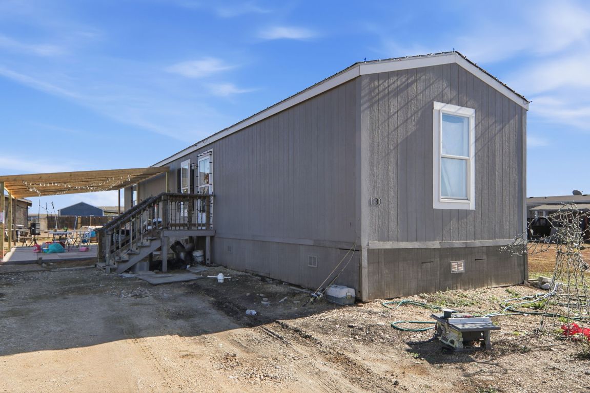 1130 Rustler Pass Kyle, TX 78640 - Photo 16 of 21 View of property exterior featuring crawl space