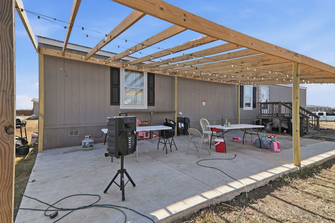 1130 Rustler Pass Kyle, TX 78640 - Photo 18 of 21 View of patio / terrace featuring outdoor dining space