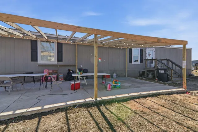 a view of a dinning room with a patio
