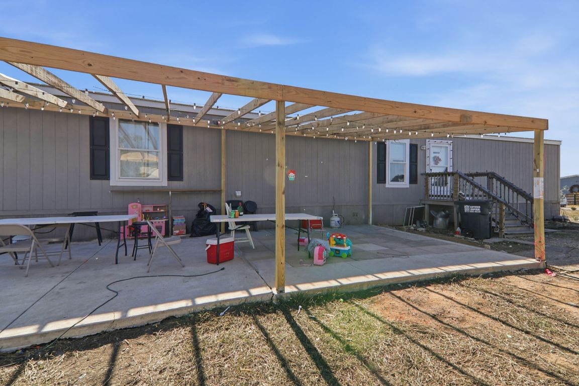 1130 Rustler Pass Kyle, TX 78640 - Photo 19 of 21 View of patio / terrace featuring a pergola