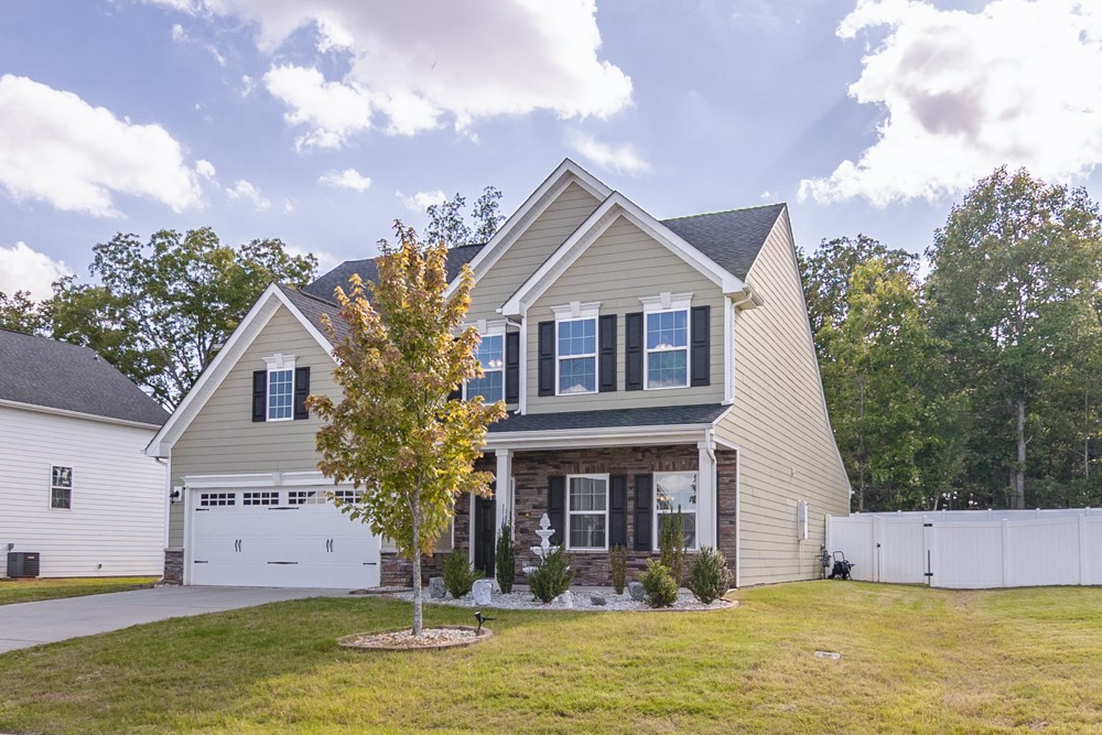 This charming residence offers comfortable living spaces and classic architectural details.