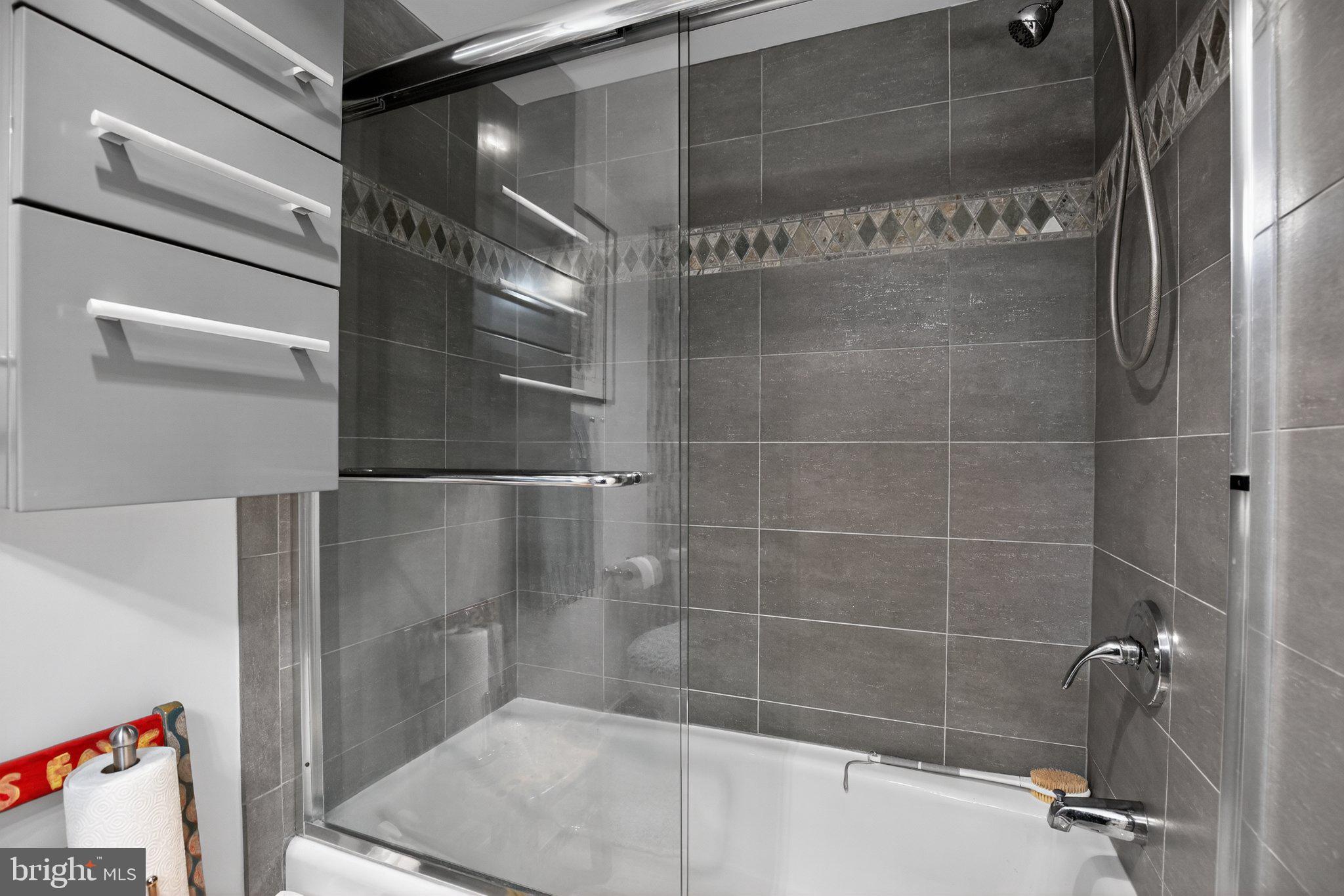 700 7th Street Southwest, Unit 526 Washington, DC 20024 - Photo 27 of 33 Sleek modern bathroom retreat.