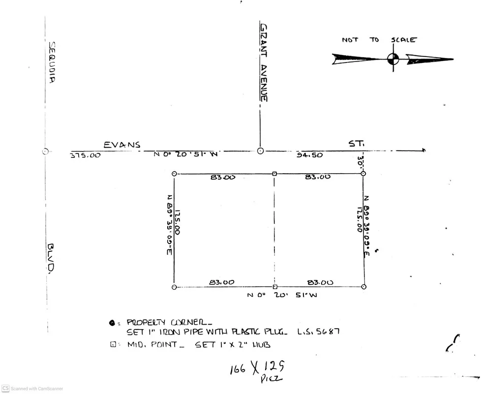 a picture of a bathroom with a shower