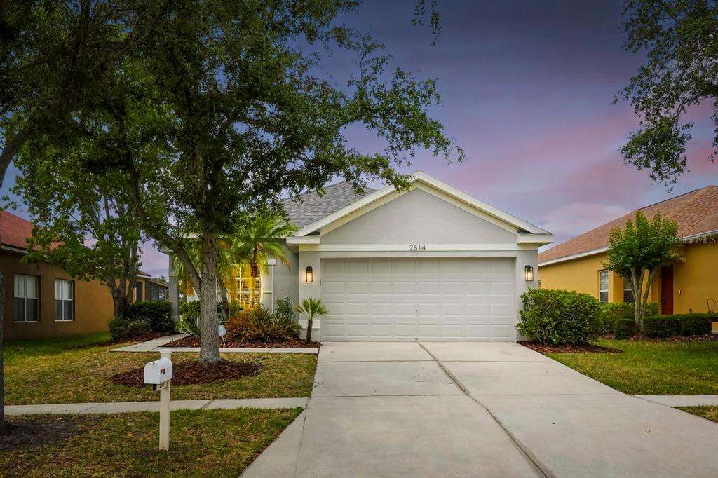 2814 Graphite Court Valrico, FL 33594 - Photo 1 of 1 a front view of a house with garden
