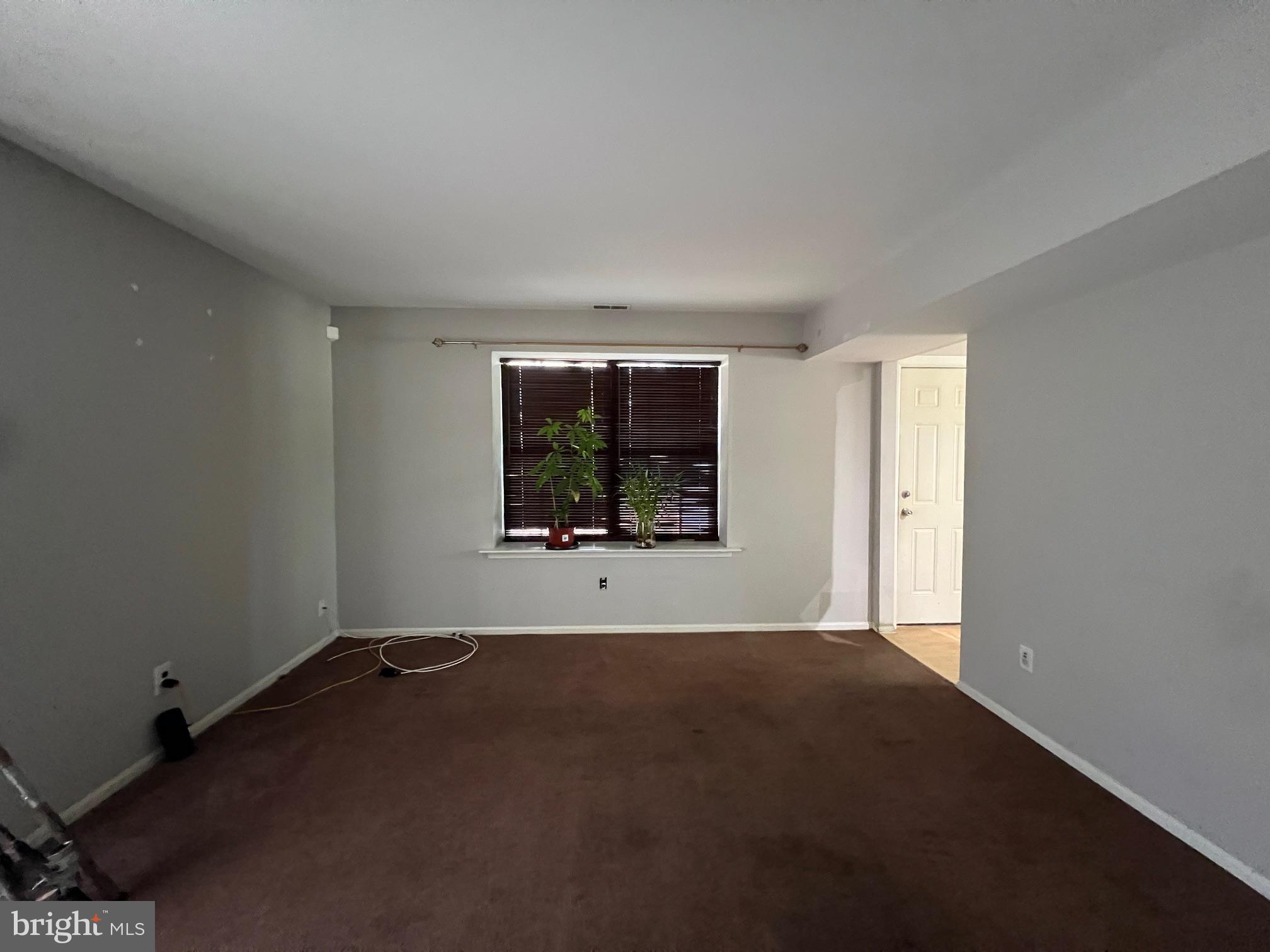 41 Hampton Gate Drive Sicklerville, NJ 08081 - Photo 2 of 4 a view of an empty room with a window
