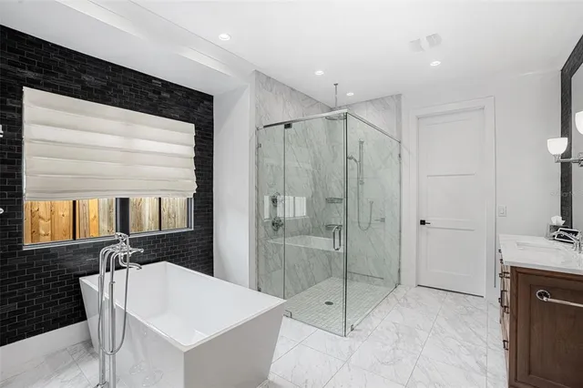 a utility room with cabinets dryer and washer