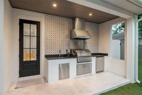 a view of a swimming pool with lounge chair