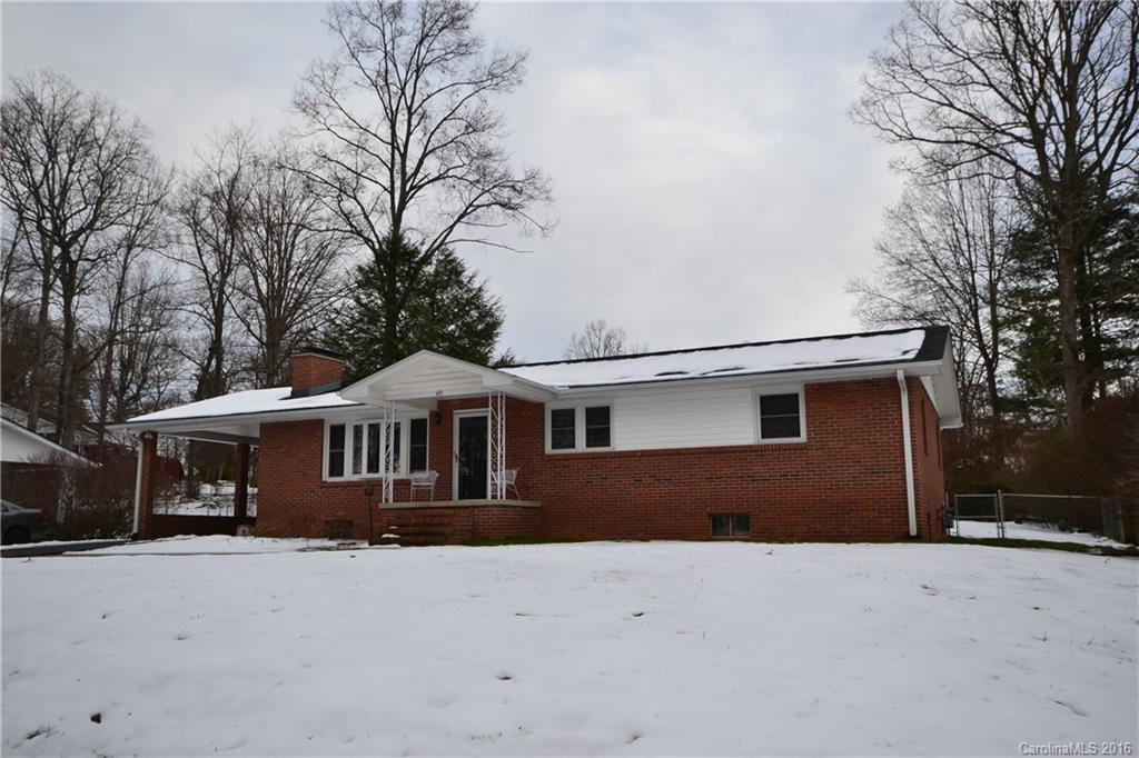 445 Loop Road Hendersonville, NC 28792 - Photo 12 of 13 a front view of a house with a yard