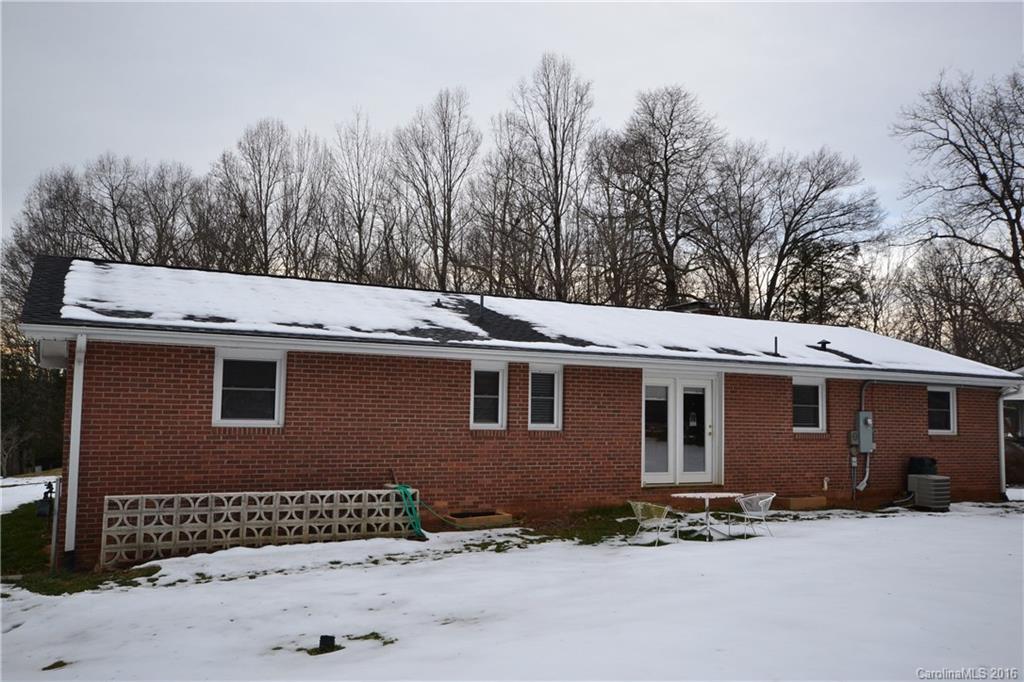445 Loop Road Hendersonville, NC 28792 - Photo 13 of 13 a view of a house with a patio