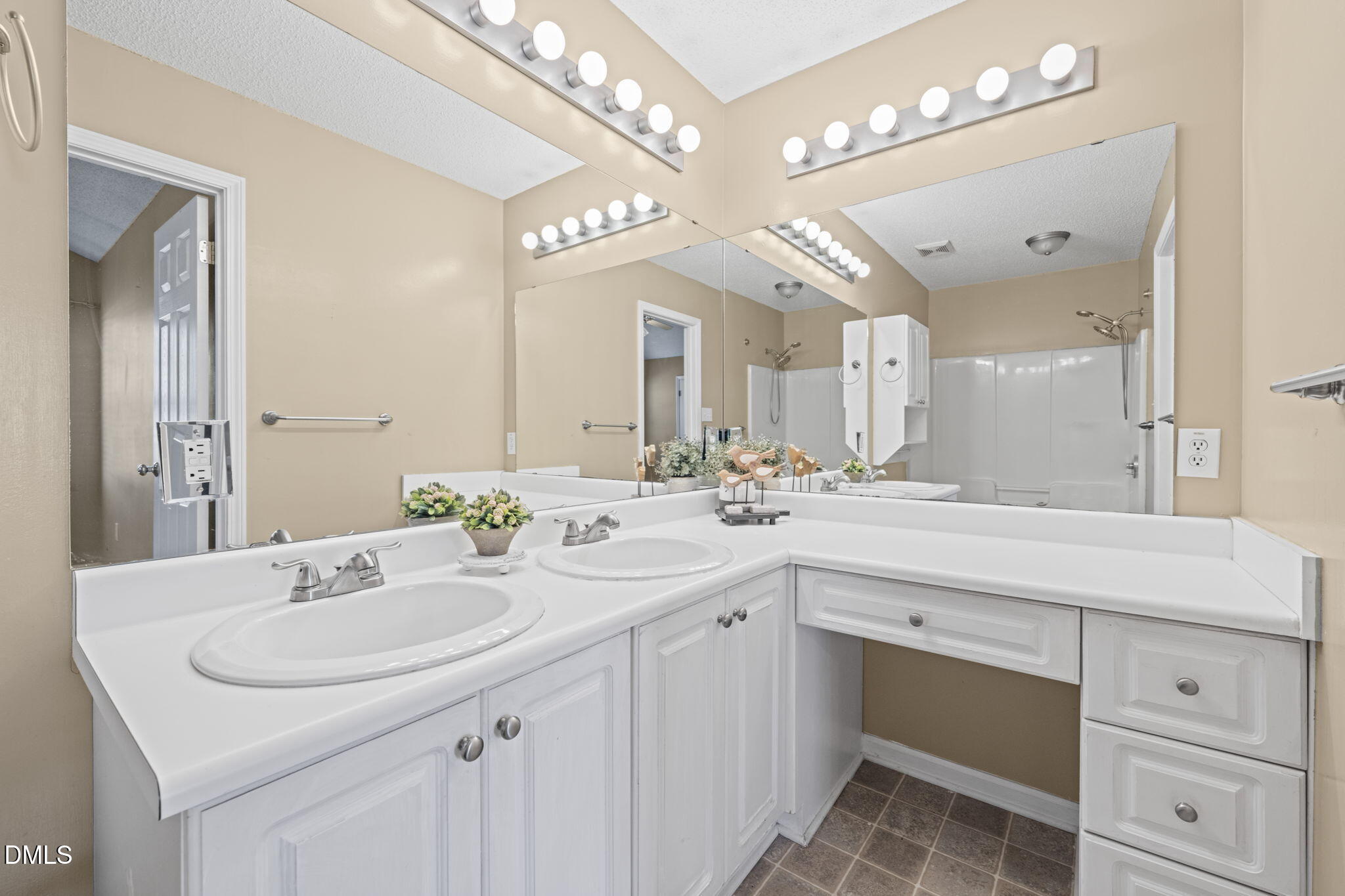 307 Laurel Ridge Drive Clayton, NC 27520 - Photo 22 of 51 a bathroom with a sink double vanity and a mirror