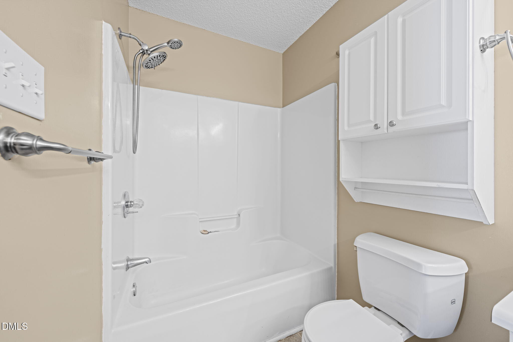 307 Laurel Ridge Drive Clayton, NC 27520 - Photo 23 of 51 a bathroom with a toilet and a shower