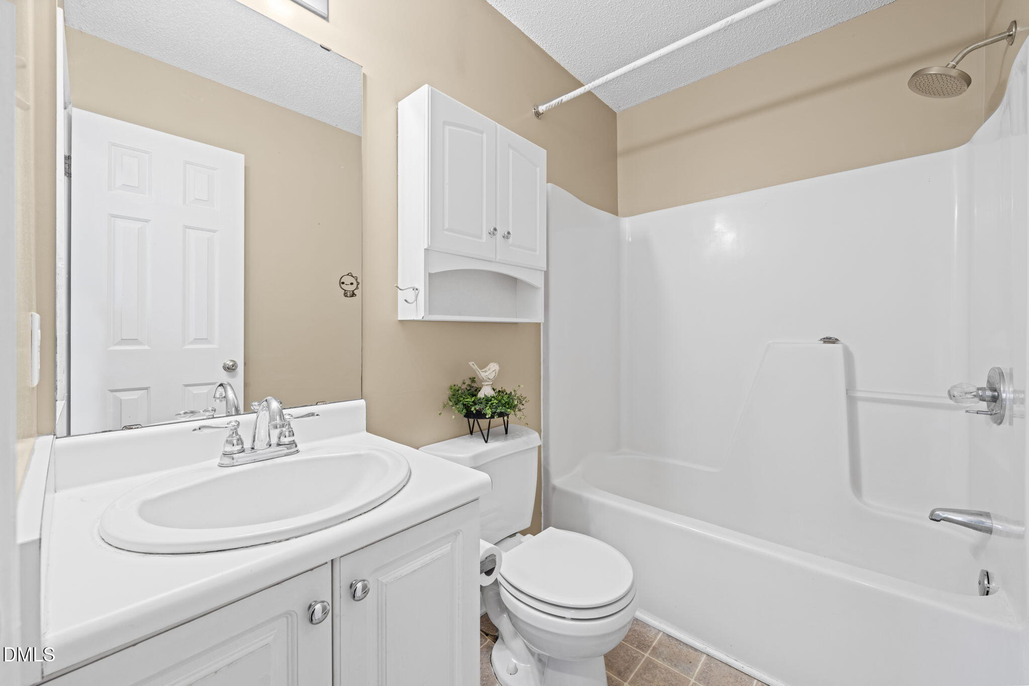 307 Laurel Ridge Drive Clayton, NC 27520 - Photo 25 of 51 a bathroom with a sink toilet and shower