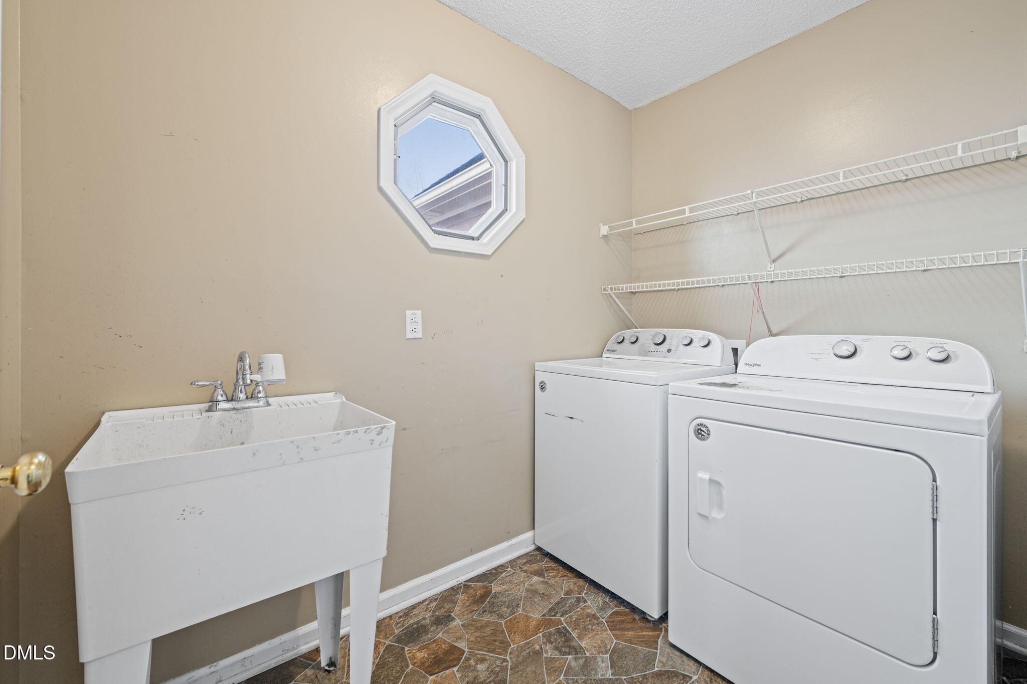 307 Laurel Ridge Drive Clayton, NC 27520 - Photo 29 of 51 a utility room with dryer and washer