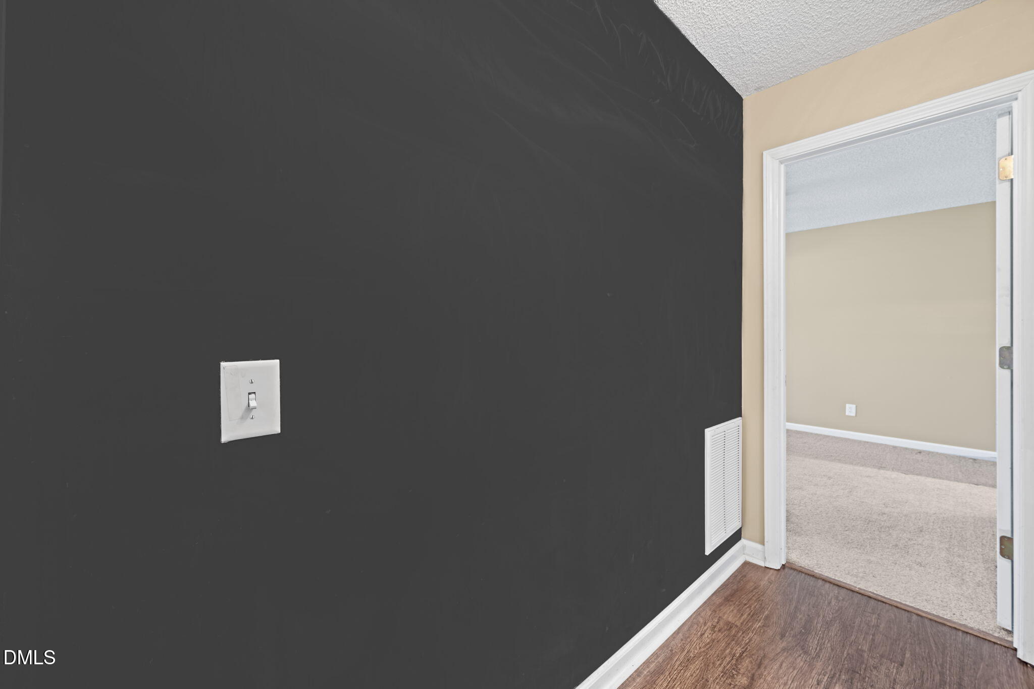 307 Laurel Ridge Drive Clayton, NC 27520 - Photo 30 of 51 an empty room with windows