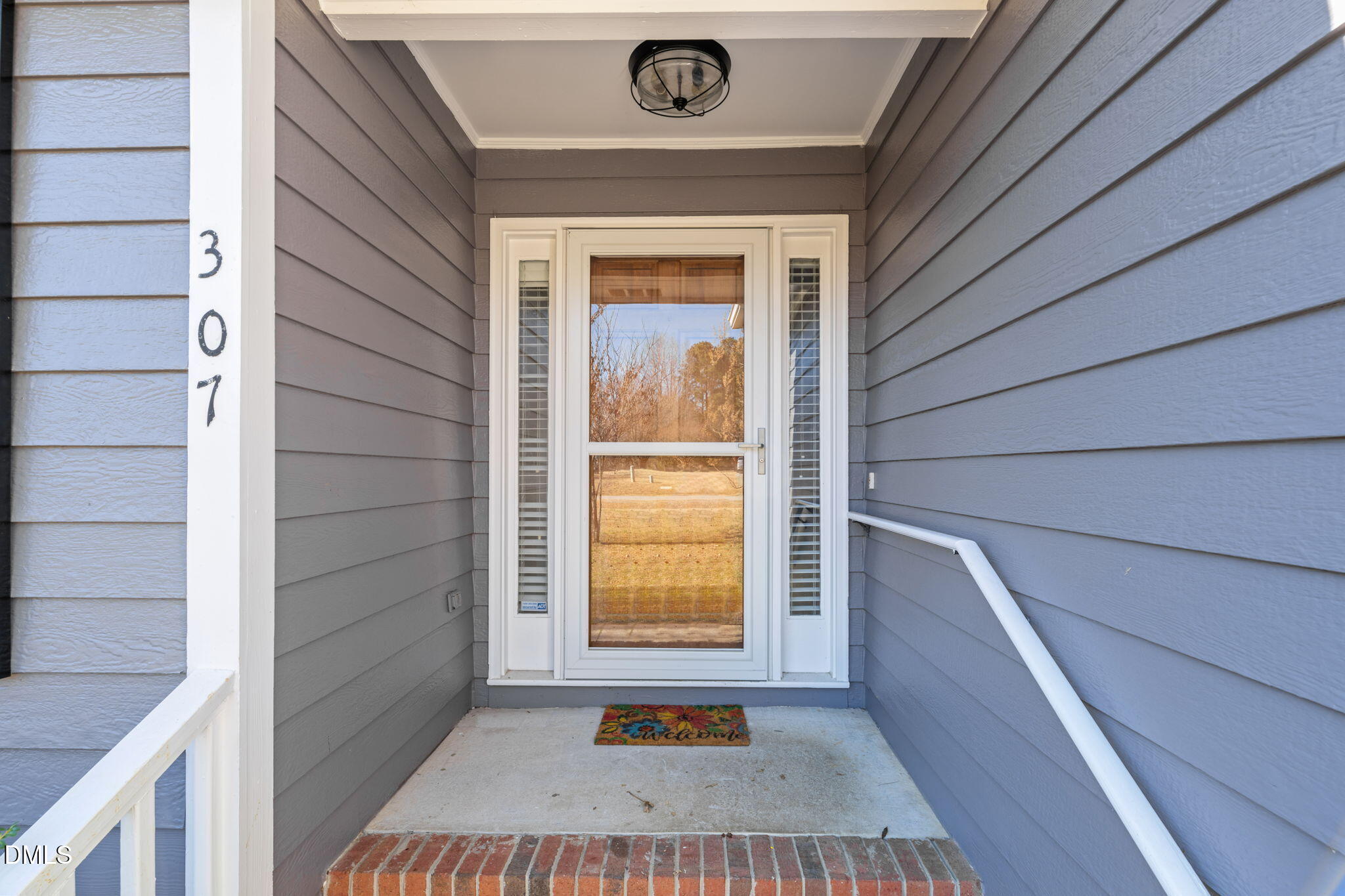 307 Laurel Ridge Drive Clayton, NC 27520 - Photo 3 of 51 a view of an entryway of a house