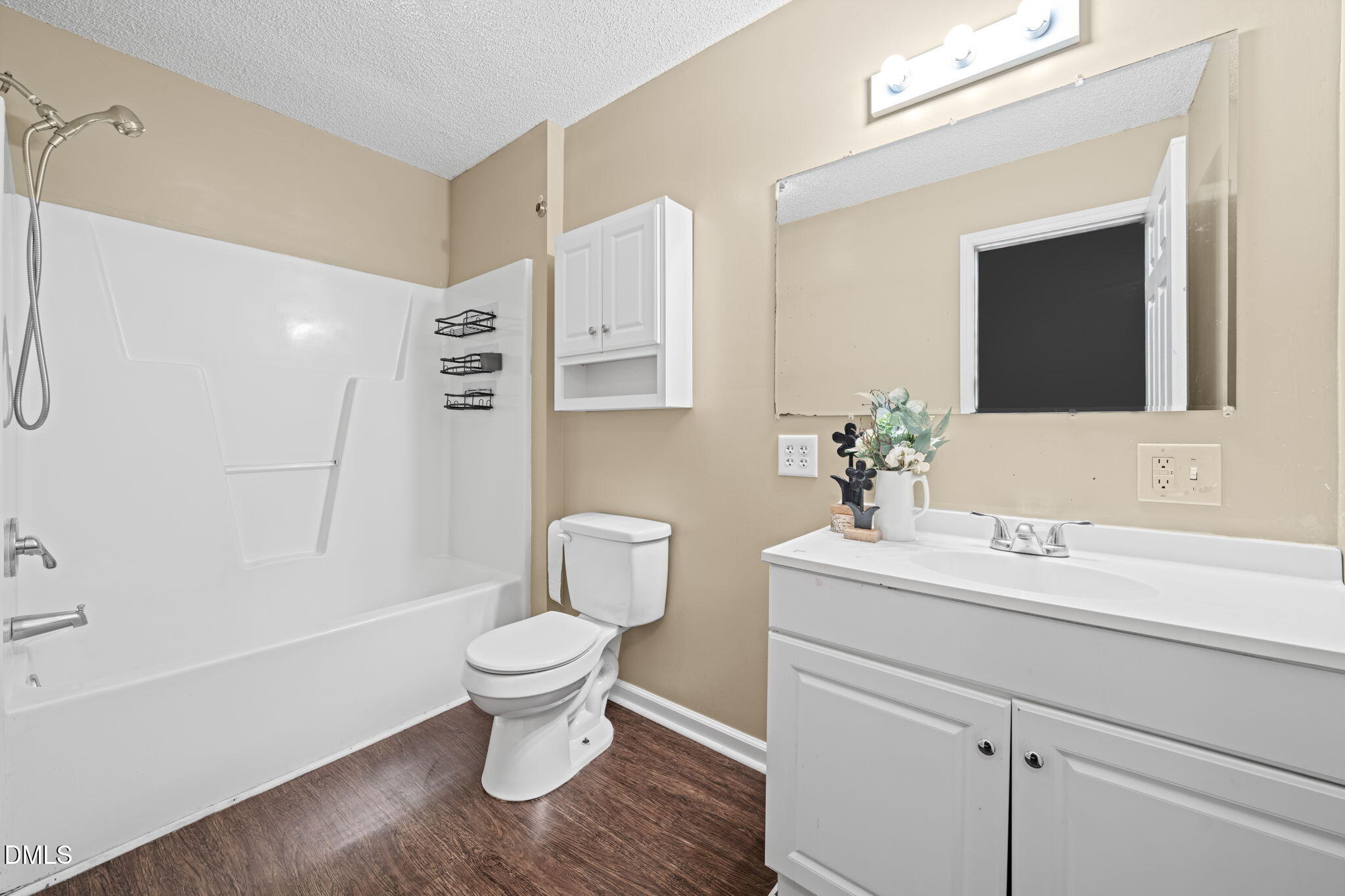 307 Laurel Ridge Drive Clayton, NC 27520 - Photo 36 of 51 a bathroom with a sink toilet and shower