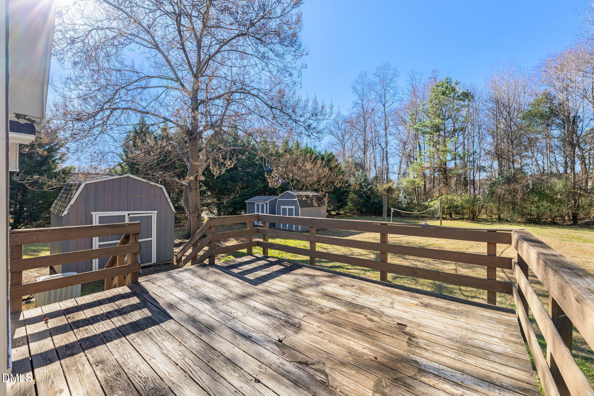 307 Laurel Ridge Drive Clayton, NC 27520 - Photo 38 of 51 a view of a roof deck with two couches and wooden floor