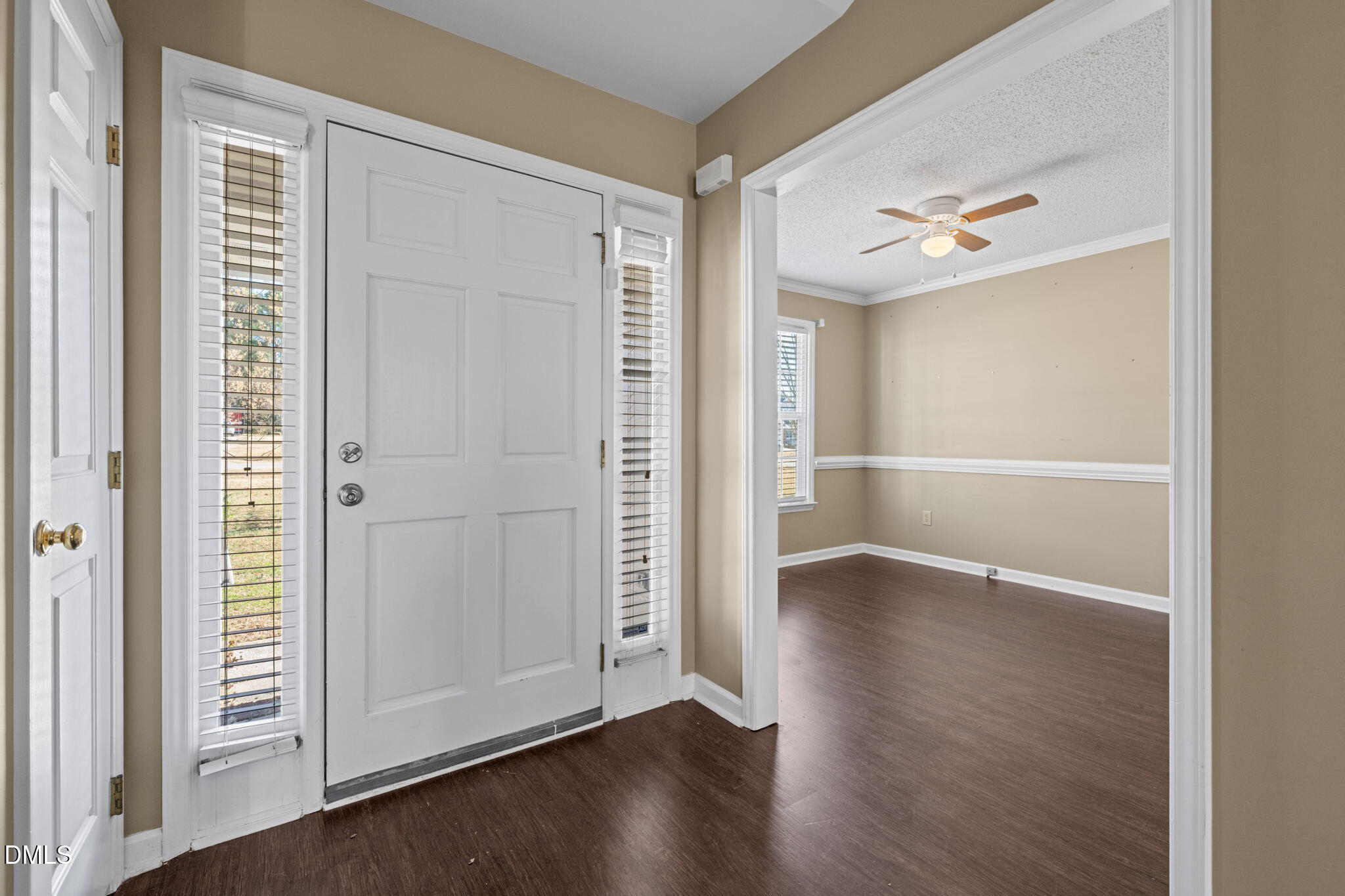 307 Laurel Ridge Drive Clayton, NC 27520 - Photo 4 of 51 an empty room with wooden floor closet and windows