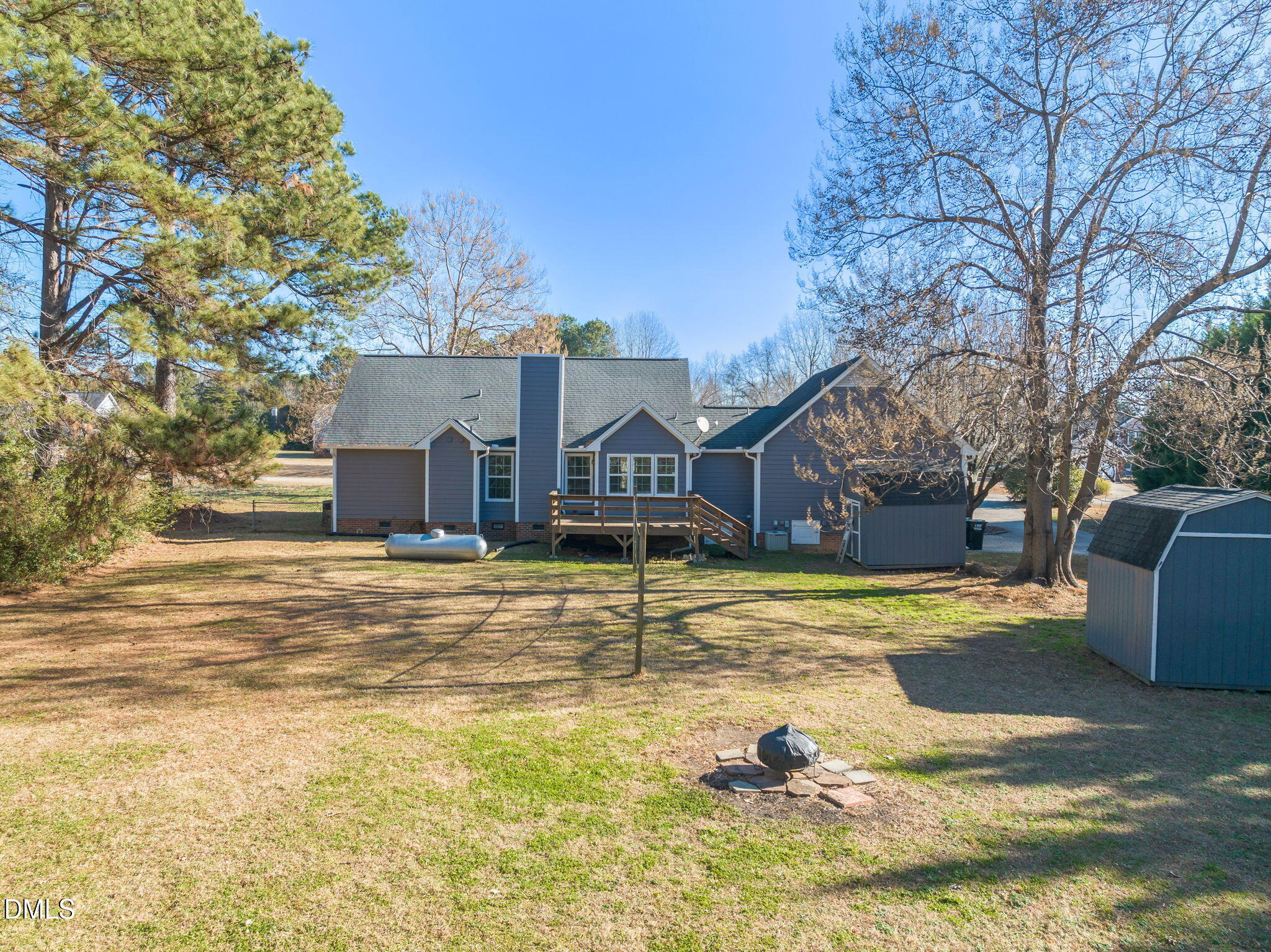 307 Laurel Ridge Drive Clayton, NC 27520 - Photo 43 of 51 a view of a swimming pool with a house