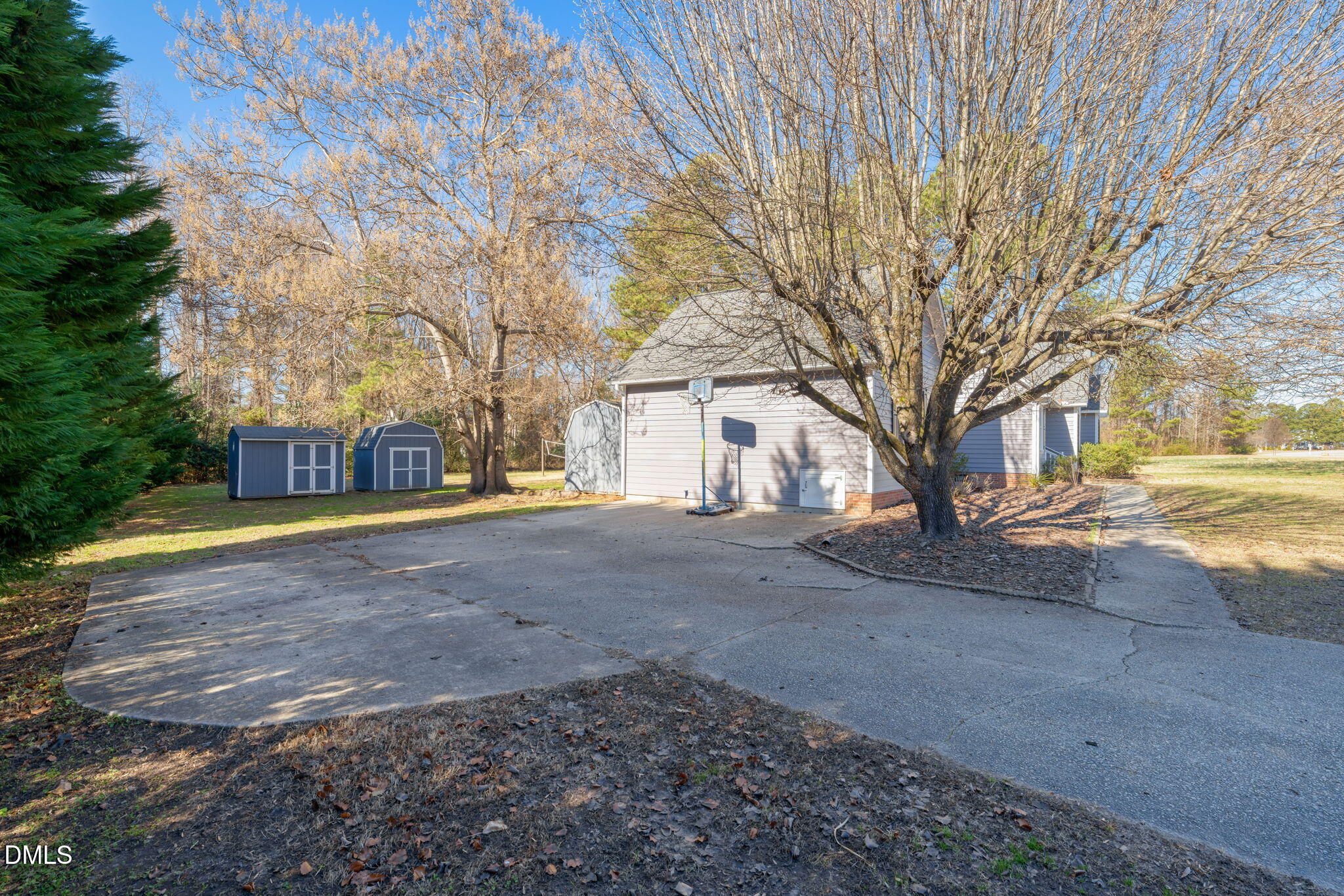 307 Laurel Ridge Drive Clayton, NC 27520 - Photo 44 of 51 a view of road with large trees