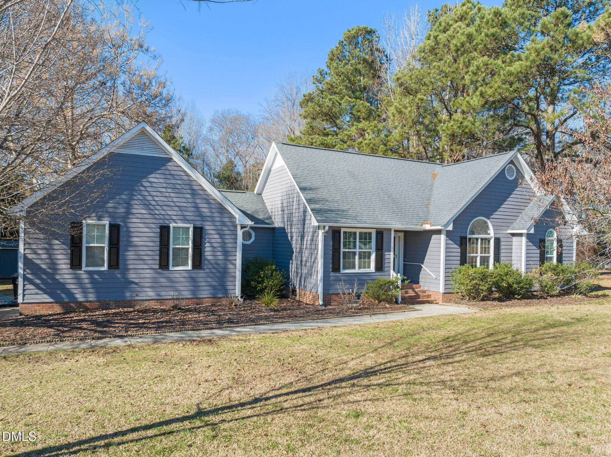 307 Laurel Ridge Drive Clayton, NC 27520 - Photo 45 of 51 a front view of house with yard