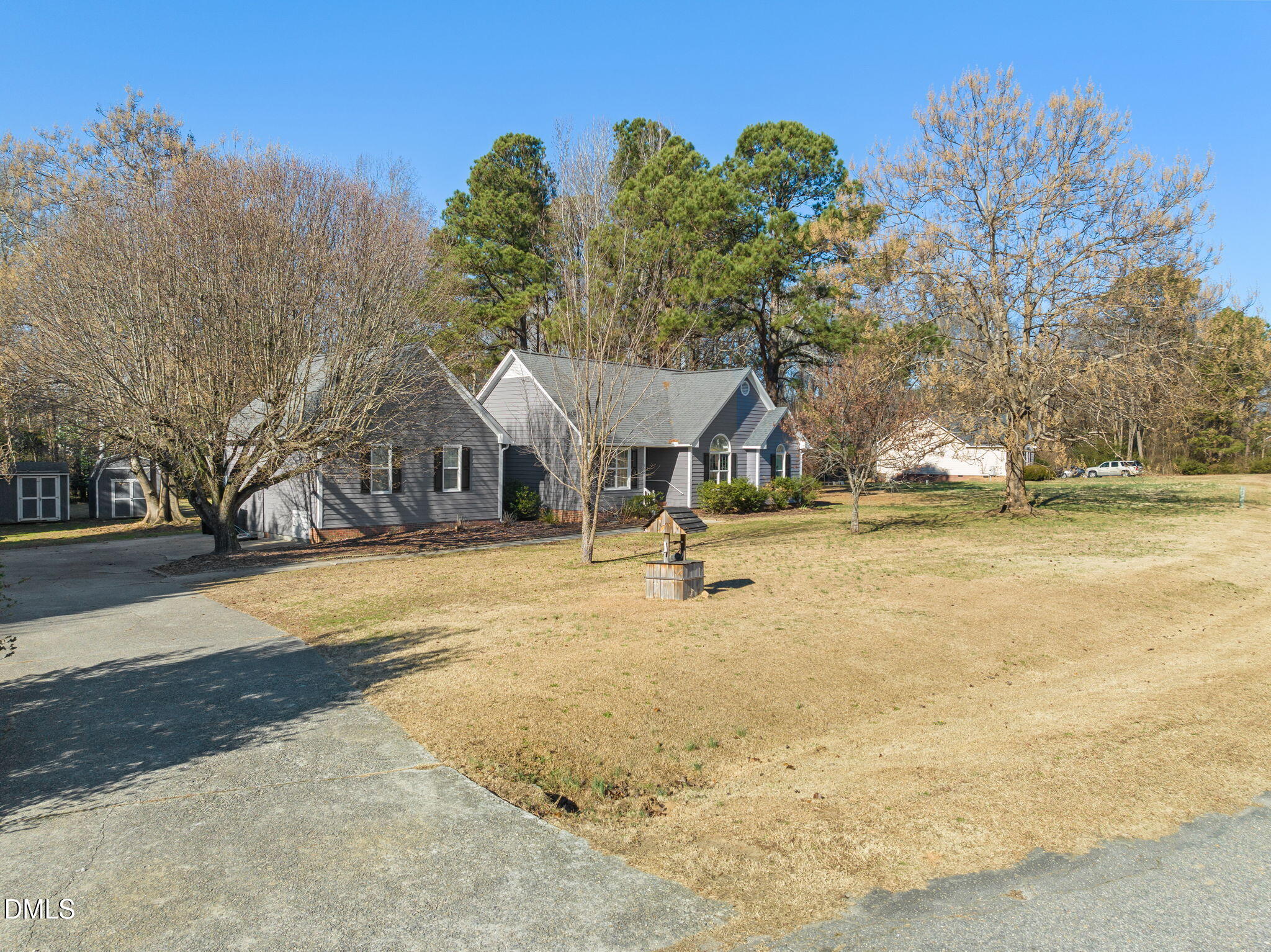 307 Laurel Ridge Drive Clayton, NC 27520 - Photo 47 of 51 a house with trees in front of it