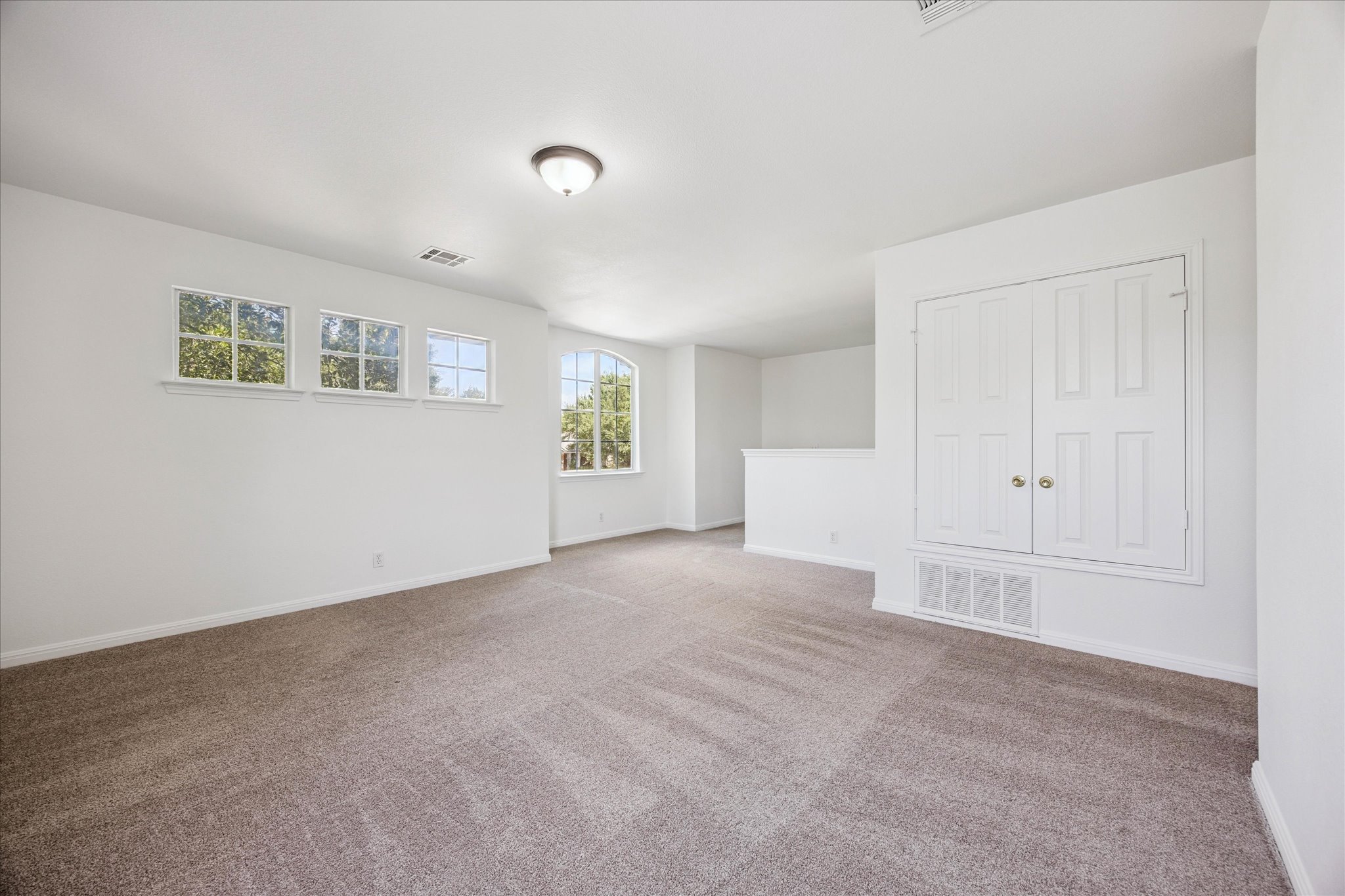111 North Field Street Round Rock, TX 78681 - Photo 23 of 40 a view of empty room with windows