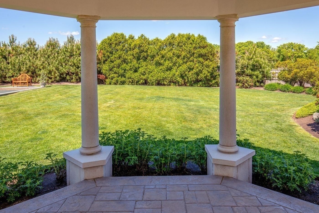 129 Atlantic Road Gloucester, MA 01930 - Photo 29 of 32 a view of a garden with statue