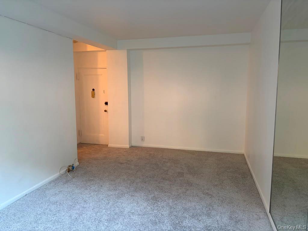 99-60 63rd Road, Unit 1H Queens, NY 11374 - Photo 4 of 11 a view of an empty room