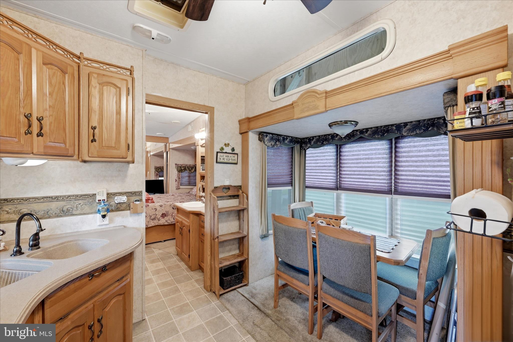 Lot 20 Hot Dog Road Falling Waters, WV 25419 - Photo 8 of 26 a kitchen with a table chairs and a stove