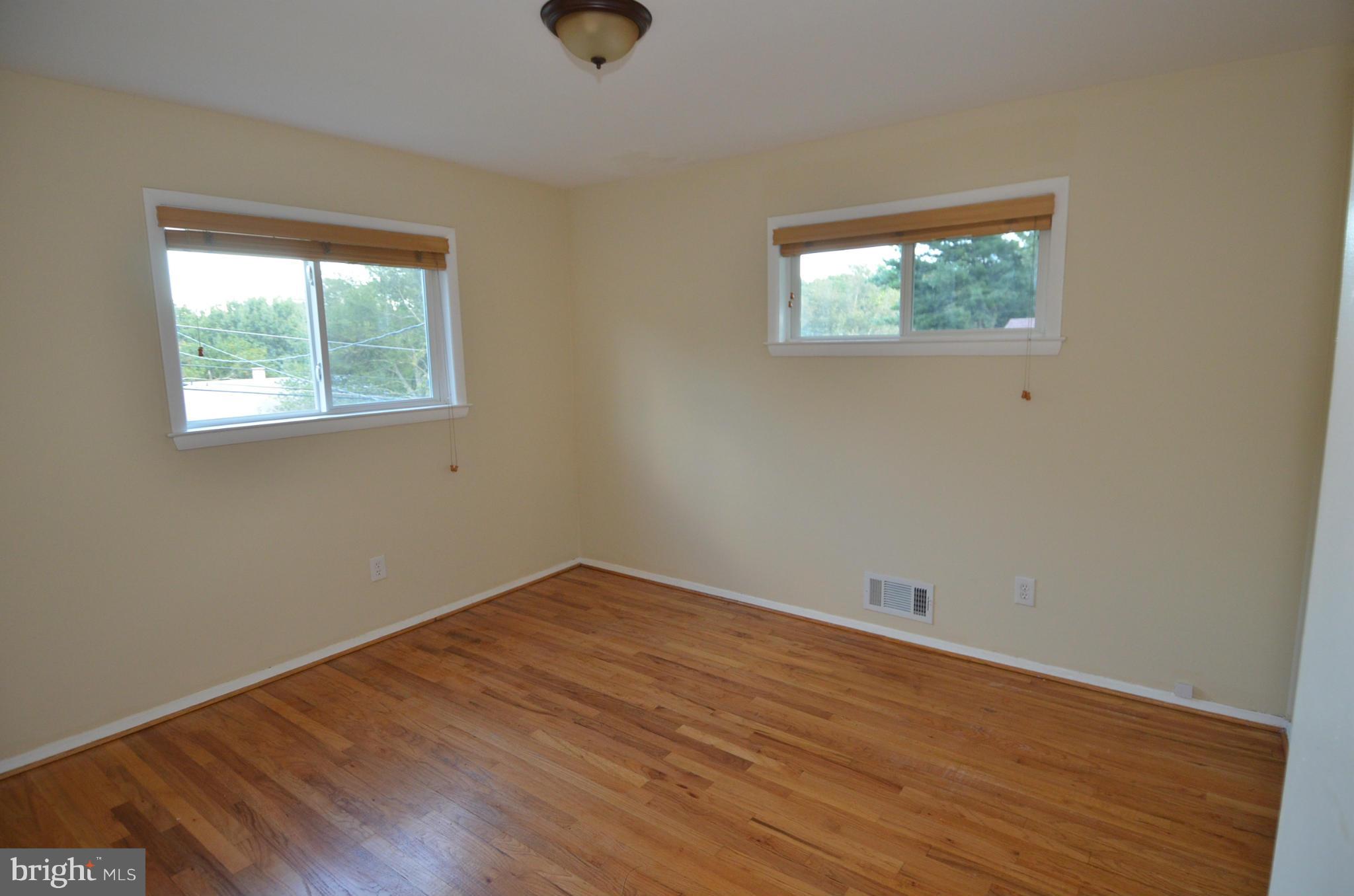 11806 Selfridge Road Silver Spring, MD 20906 - Photo 15 of 25 an empty room with a window