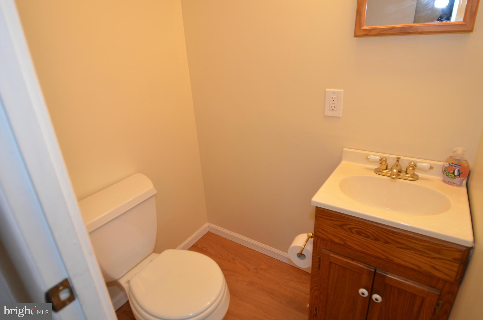 11806 Selfridge Road Silver Spring, MD 20906 - Photo 20 of 25 a bathroom with a sink and a toilet