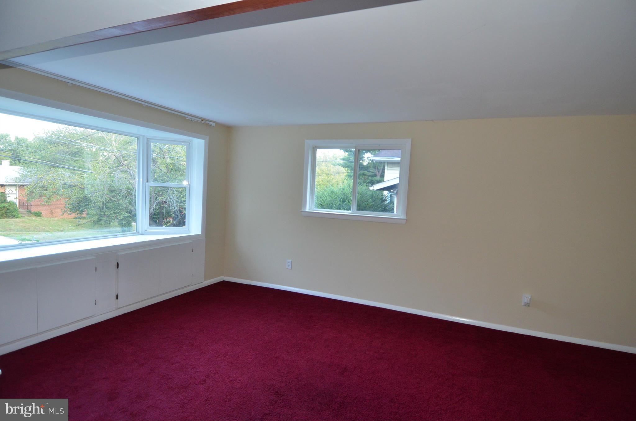 11806 Selfridge Road Silver Spring, MD 20906 - Photo 3 of 25 an empty room with windows