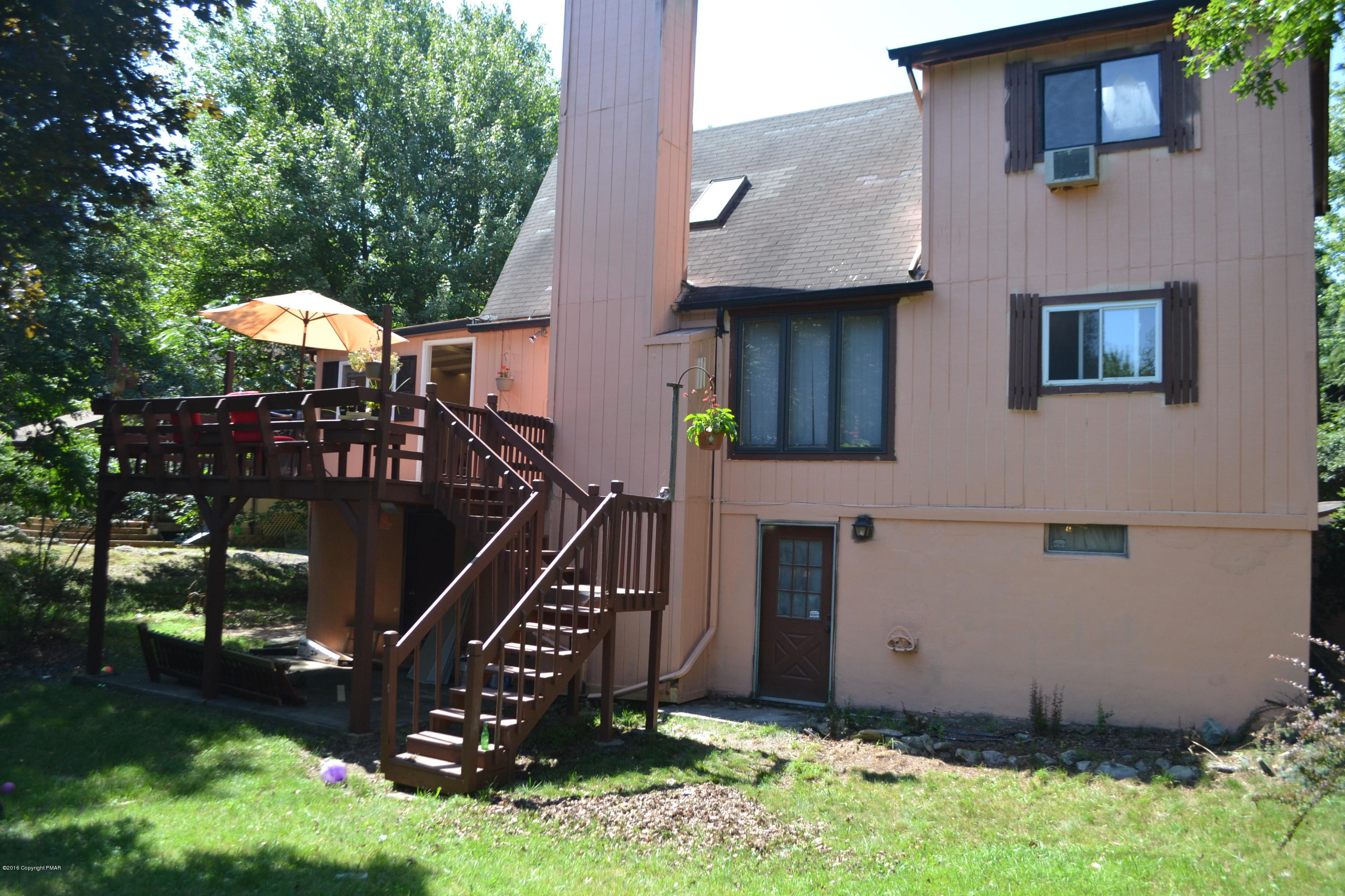 1015 Clover Road Long Pond, PA 18334 - Photo 32 of 35 a front view of a house with a yard