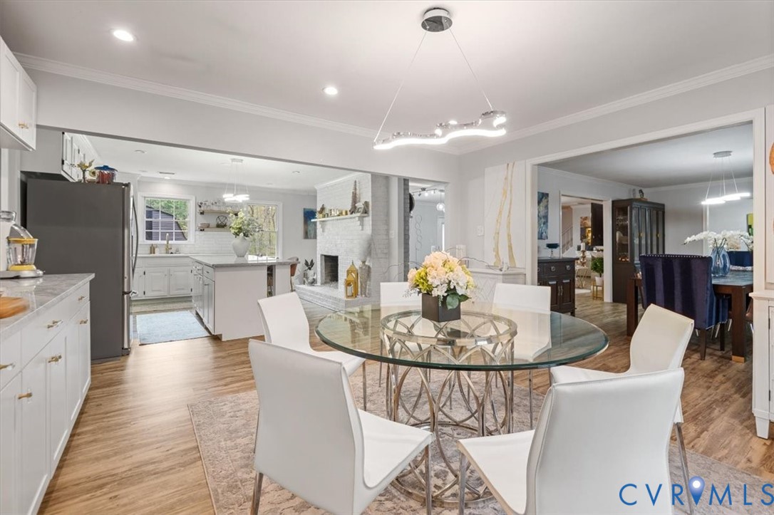 9820 Beaver Bridge Road Chesterfield, VA 23838 - Photo 11 of 51 This bright space features light wood-style floori