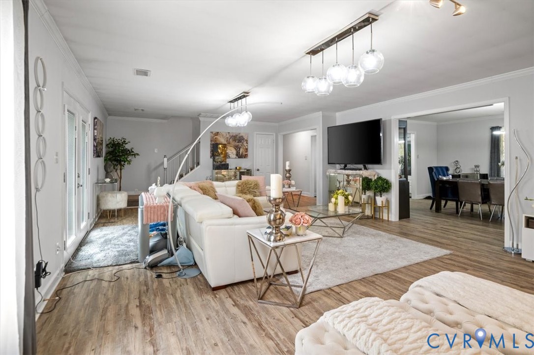 9820 Beaver Bridge Road Chesterfield, VA 23838 - Photo 20 of 51 Spacious living area featuring light-toned floorin
