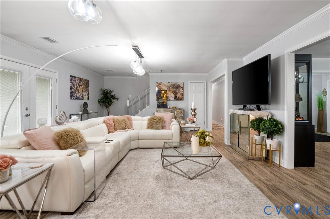 9820 Beaver Bridge Road Chesterfield, VA 23838 - Photo 21 of 51 The living area features light-colored walls and l