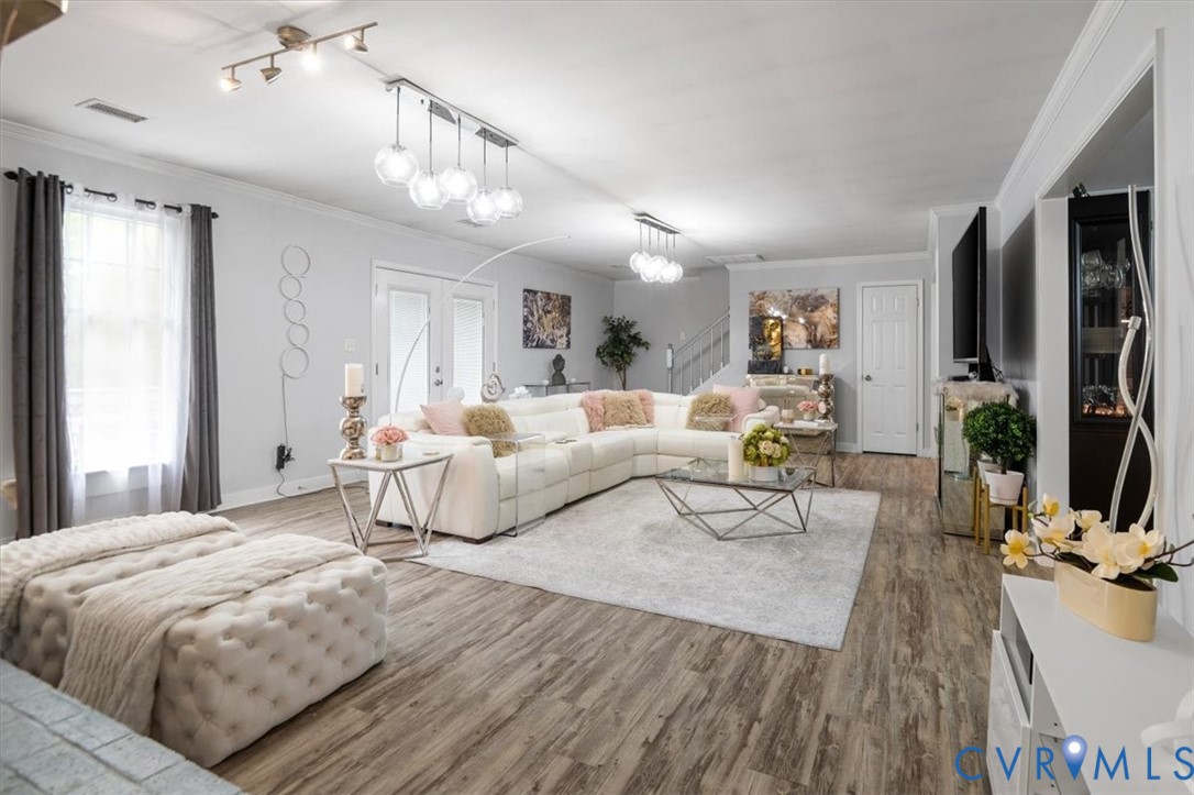 9820 Beaver Bridge Road Chesterfield, VA 23838 - Photo 22 of 51 Spacious living area featuring light wood-look flo