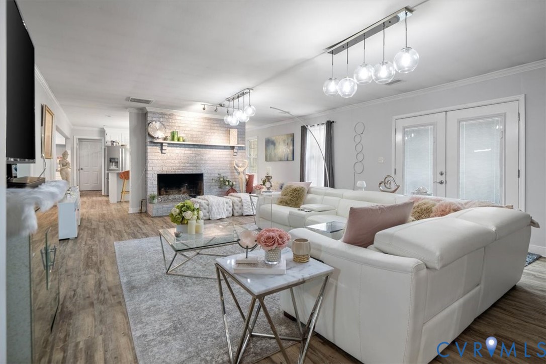 9820 Beaver Bridge Road Chesterfield, VA 23838 - Photo 25 of 51 Spacious living area featuring light-colored wood-