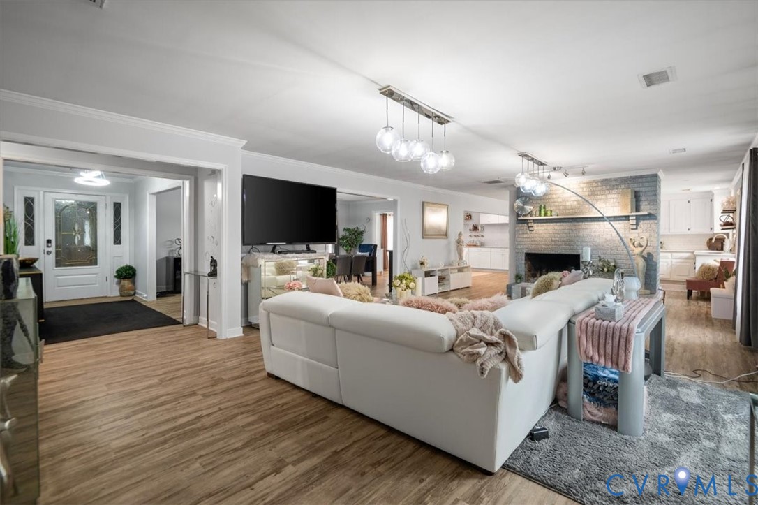 9820 Beaver Bridge Road Chesterfield, VA 23838 - Photo 27 of 51 The living area features light-toned flooring, a f
