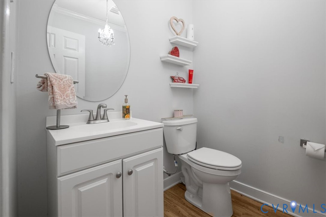 9820 Beaver Bridge Road Chesterfield, VA 23838 - Photo 29 of 51 Half Bathroom featuring a white vanity with a sink