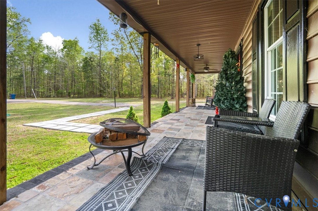 9820 Beaver Bridge Road Chesterfield, VA 23838 - Photo 3 of 51 Inviting covered front porch with a patterned ston