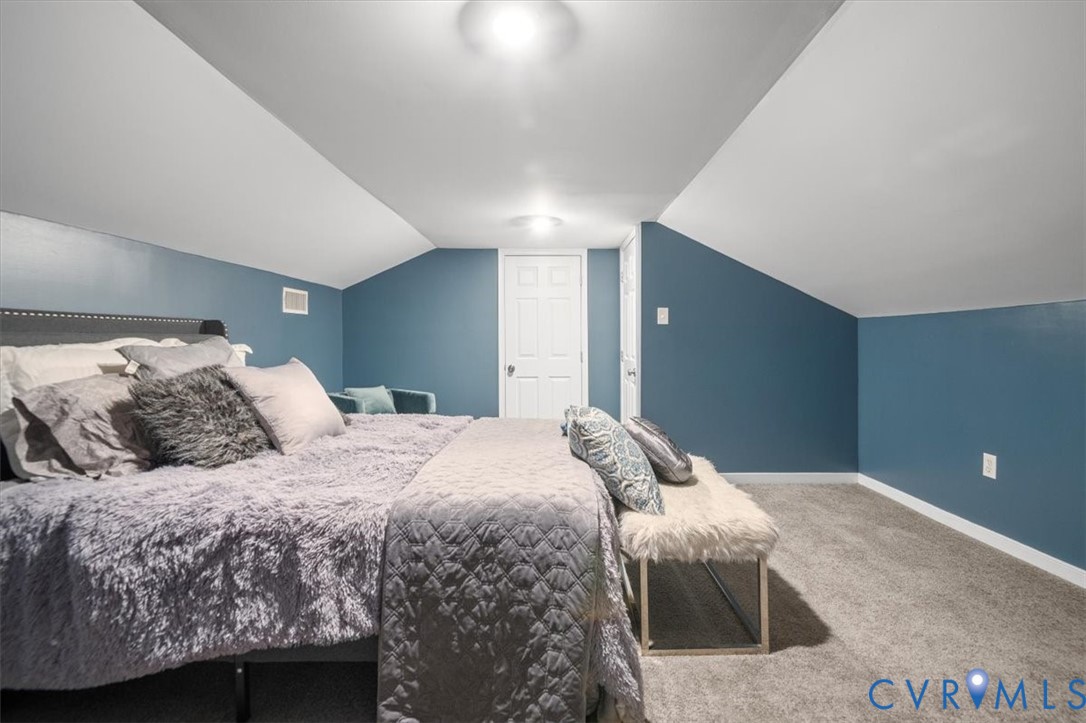 9820 Beaver Bridge Road Chesterfield, VA 23838 - Photo 33 of 51 This room features sloped white ceilings, blue wal