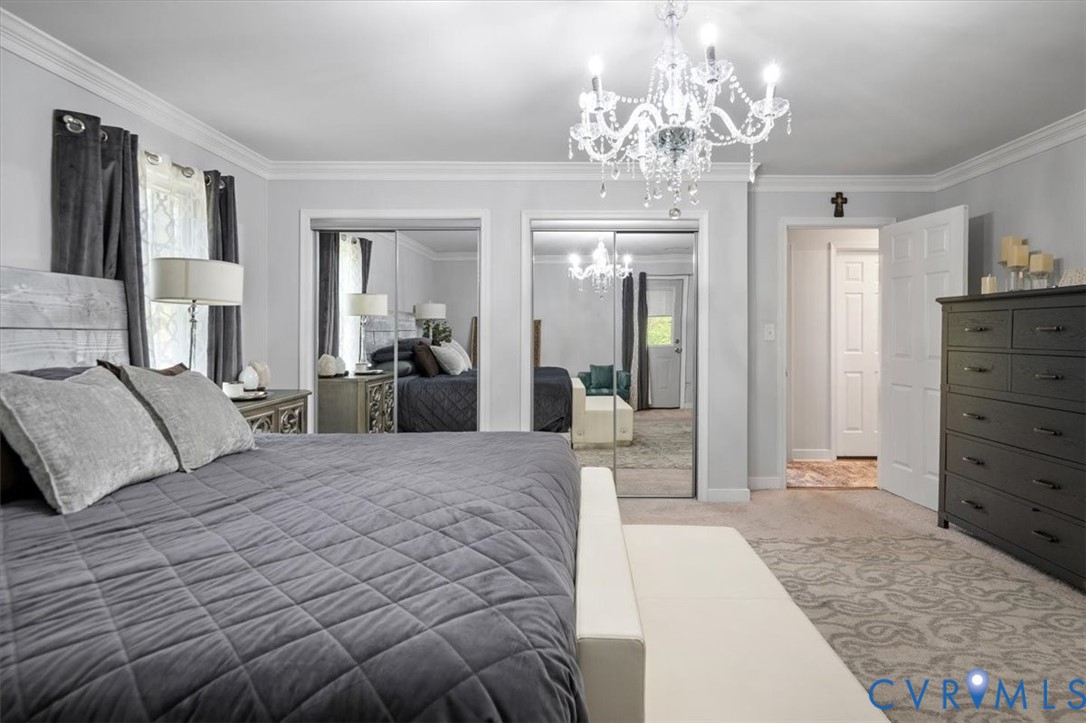 9820 Beaver Bridge Road Chesterfield, VA 23838 - Photo 38 of 51 This room features a decorative chandelier, mirror