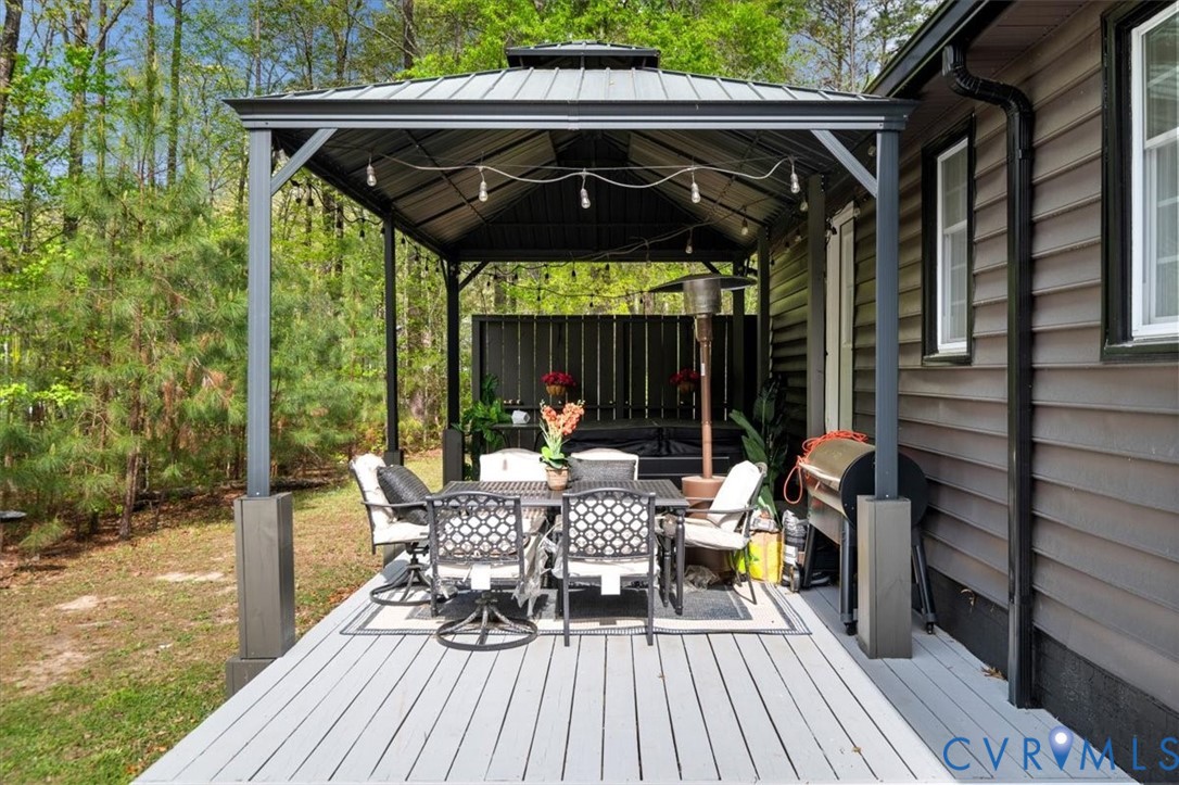 9820 Beaver Bridge Road Chesterfield, VA 23838 - Photo 48 of 51 The property features a spacious deck with light-c