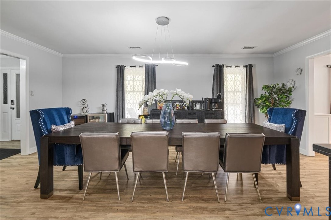 9820 Beaver Bridge Road Chesterfield, VA 23838 - Photo 7 of 51 The dining area features wood style flooring, a co