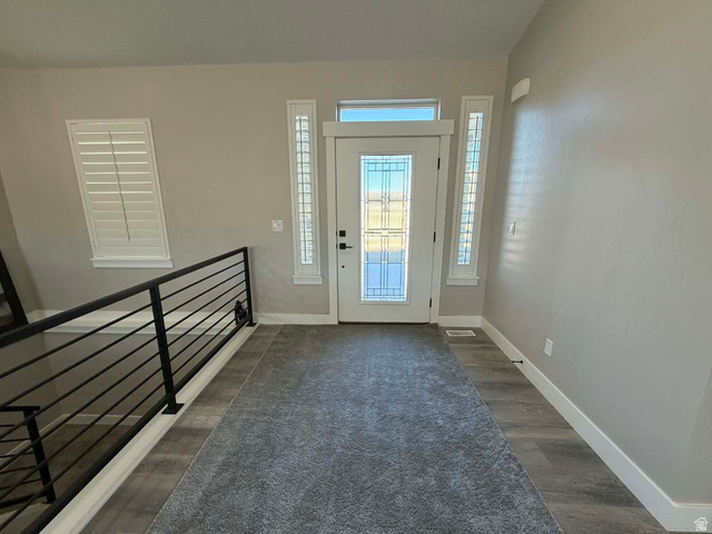 2350 North 1075 West Helper, UT 84526 - Photo 3 of 49 Entrance foyer with baseboards and dark wood-style floors